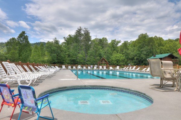 Pool access for guests at Honeysuckle Hideaway, a 1 bedroom cabin rental located in Pigeon Forge